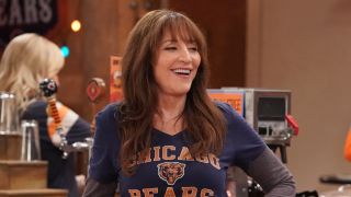 Louise in Chicago Bears shirt laughing on The Conners
