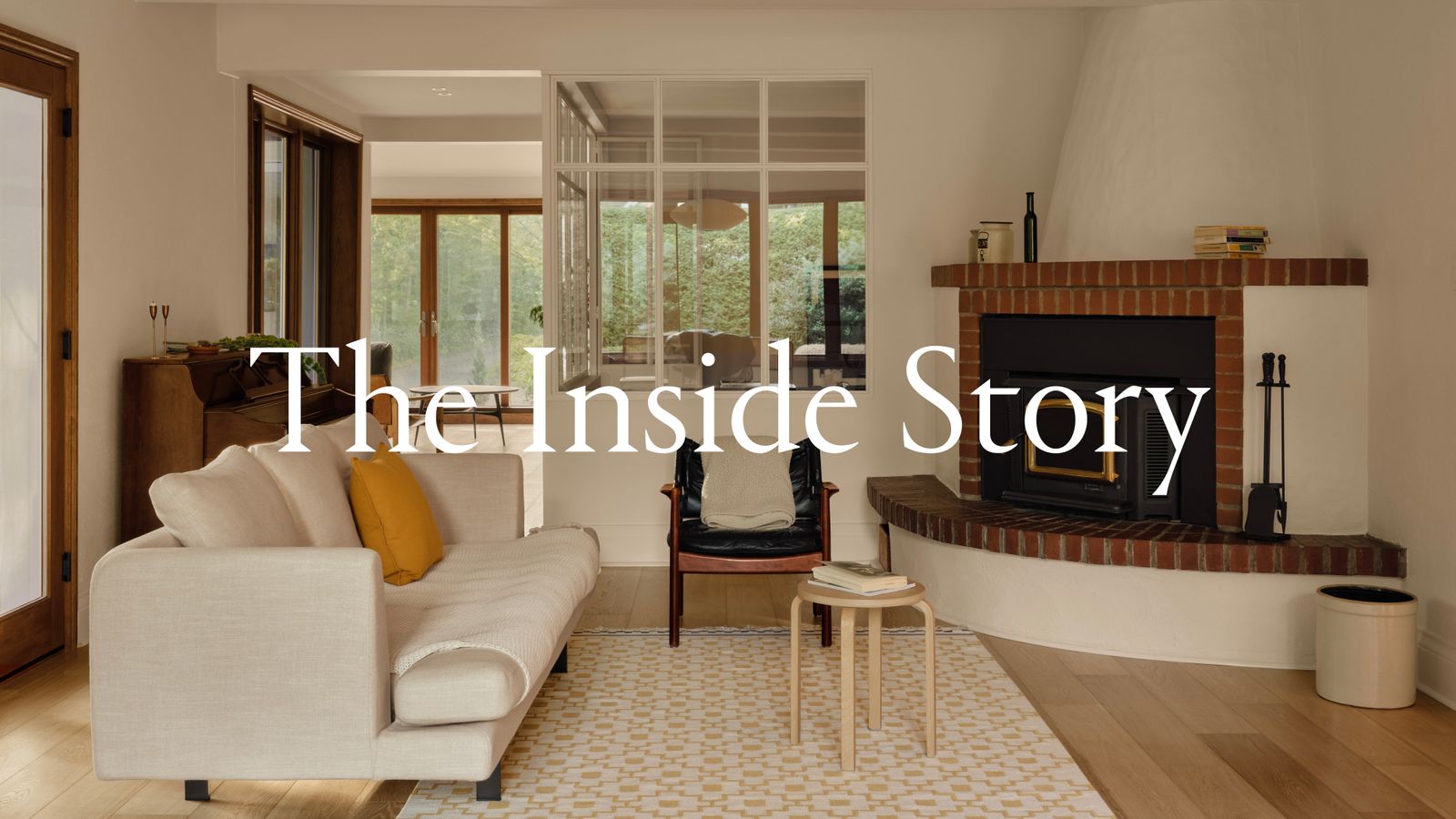 Wood furniture in glass-walled exhibition space