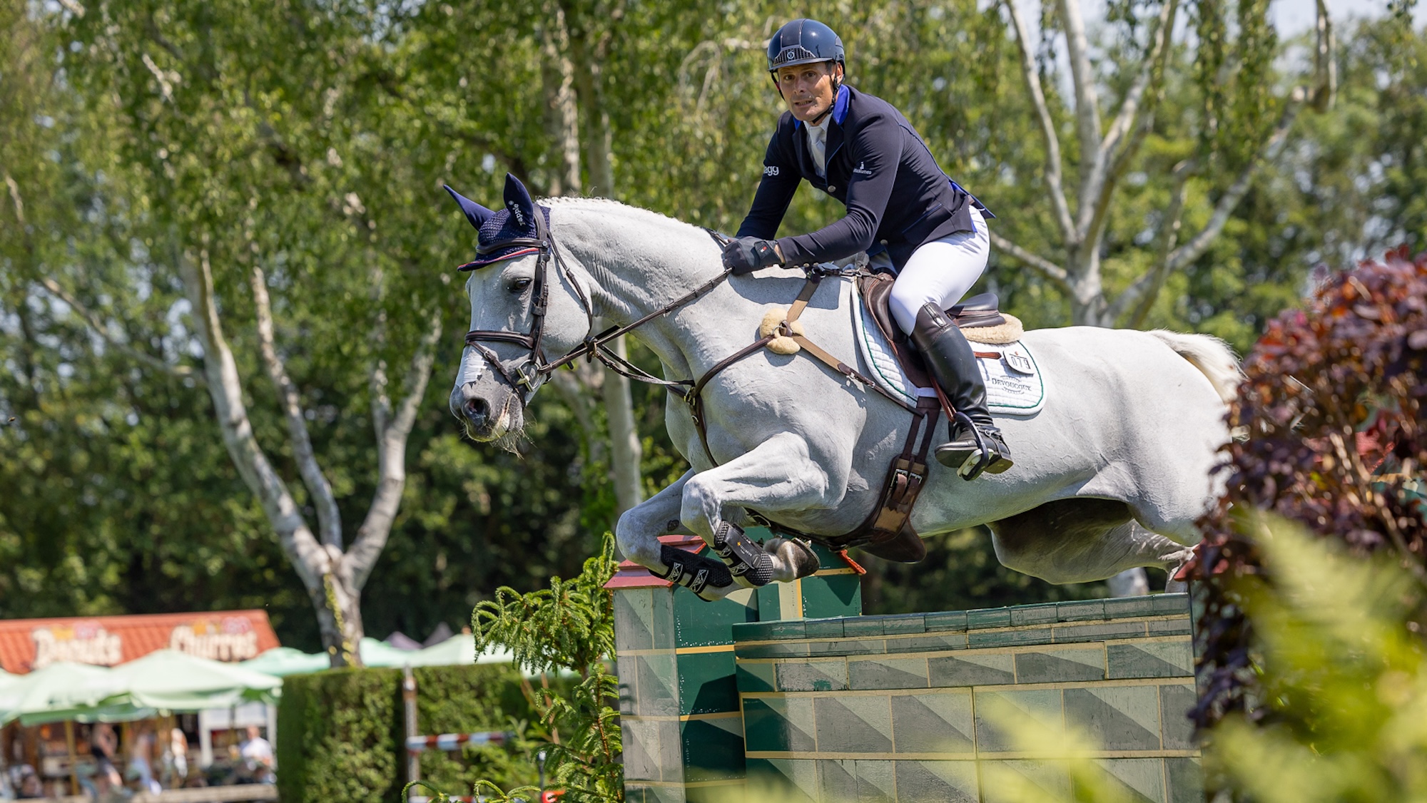 A close-up of Alex Bragg and Heggelane Houston jumping in the Derby trial
