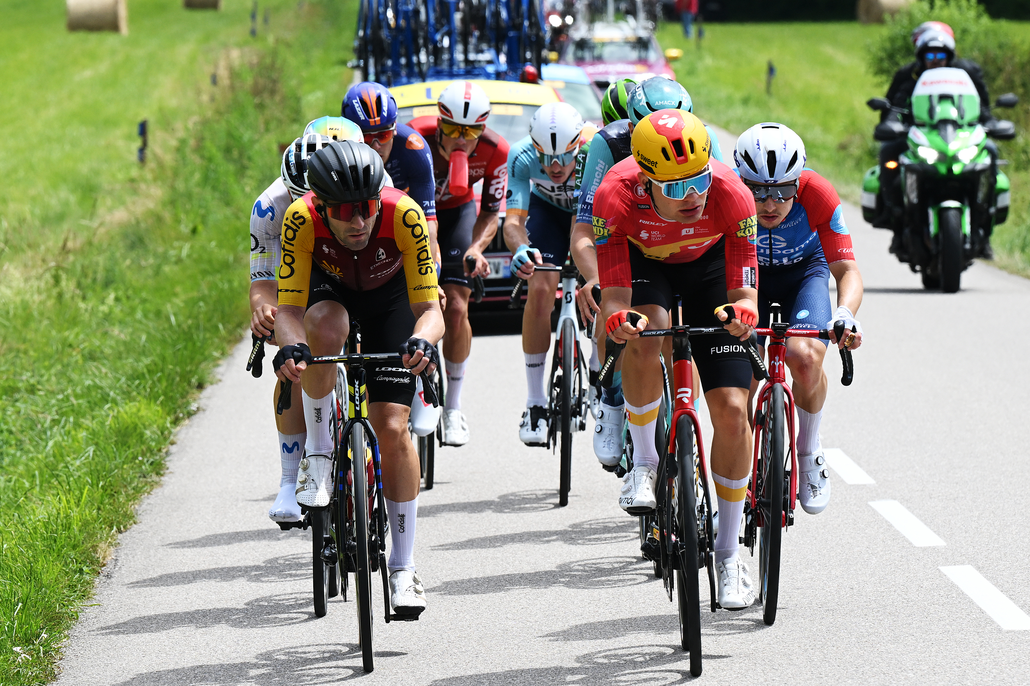 LE PUY-EN-VELAY, FRANCE - JUNE 08: (L-R) Benjamin Thomas of France and Team Cofidis, Anthon Charmig of Denmark and Team Uno-X Mobility and Clement Braz Afonso of France and Team Groupama - FDJ United compete in the breakaway during the 78th Tour Auvergne-Rhone-Alpes 2026, Stage 2 a 234.3km stage from Saint-Martin-le-Vinoux to Le Puy-en-Velay 624m / #UCIWT / on June 08, 2026 in Le Puy-en-Velay, France. (Photo by Dario Belingheri/Getty Images)