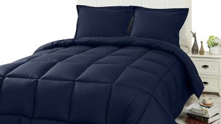 Utopia Bedding Comforter Duvet Insert review: The comforter shown in navy, placed on a white bed
