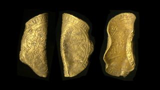 The gold noble coin, as seen from different angles.