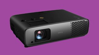 BenQ W4000i projector on purple background