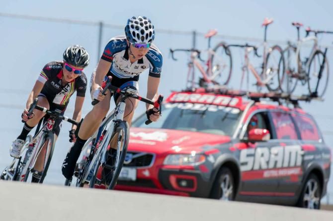The SRAM Neutral Support car follows the race-winning breakaway of Flavia Oliveira and Jacquelyn Crowell into the Laguna Seca corkscrew.
