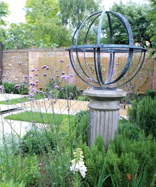 walled garden design with armillary sundial by Peter Reader Landscapes