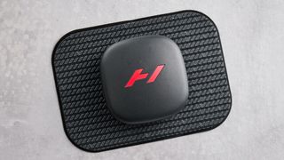 Hyperice Venom Go photographed ona grey background.