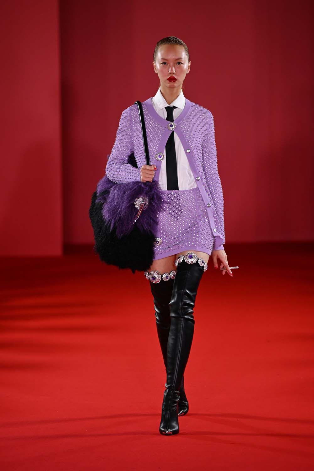 on the runway at London Fashion Week AW23