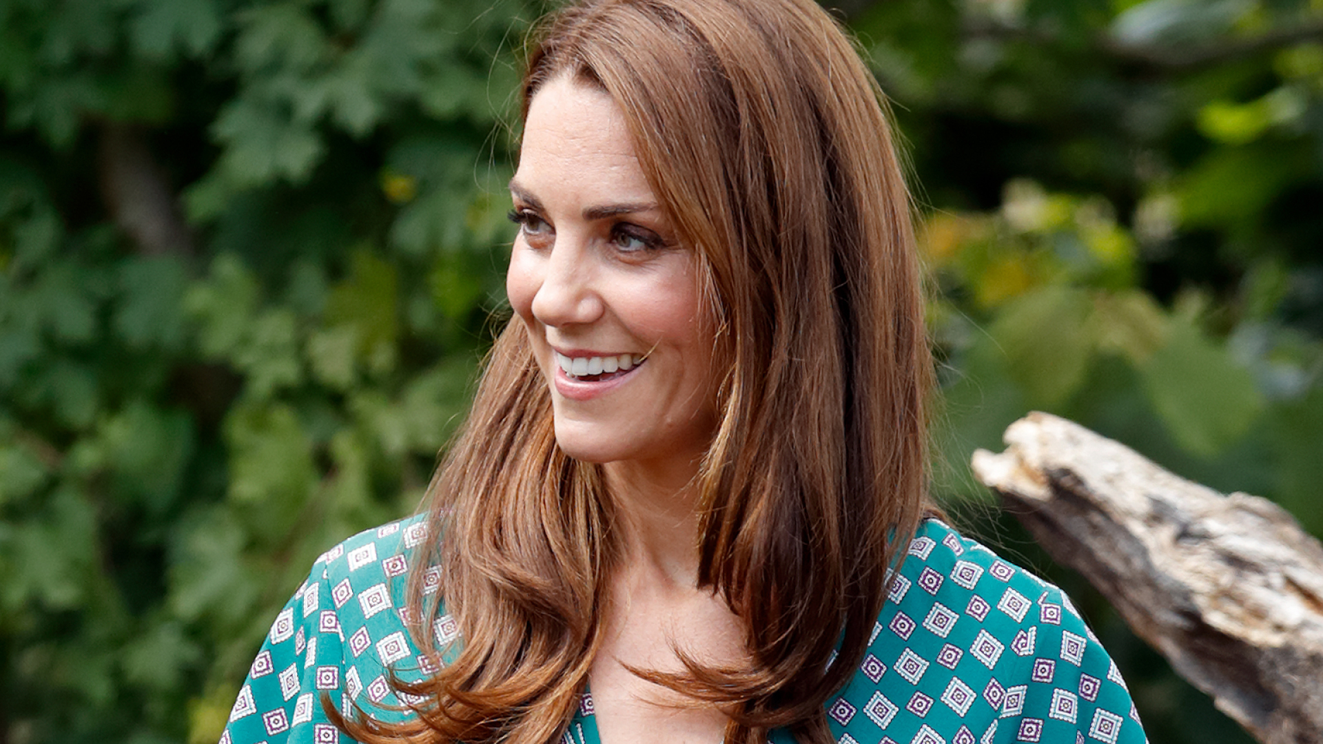 Kate Middleton wears a green patterned dress to visit the RHS Hampton Court Palace Garden Festival to view the Back to Nature Garden which she co-designed at Hampton Court Palace on July 1, 2019 
