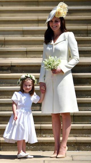 topshot princess charlotte and britain's catherine, duchess of cambridge leave the wedding ceremony of britain's prince harry, duke of sussex and us actress meghan markle at st george's chapel, windsor castle, in windsor, on may 19, 2018 photo by ben stansall pool afp photo credit should read ben stansallafp via getty images