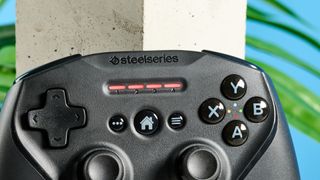 A black SteelSeries Nimbus+ mobile gaming controller for iOS, macOS and iPadOS