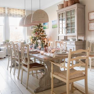 neutral dining room decorated for Christmas