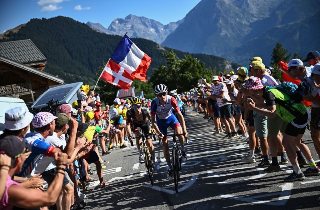 TOPSHOT GroupamaFDJ teams French rider David Gaudu CR cycles in the ascent of Alpe dHuez during the 12th stage of the 109th edition of the Tour de France cycling race 1651 km between Briancon and LAlpedHuez in the French Alps on July 14 2022 Photo by AnneChristine POUJOULAT AFP Photo by ANNECHRISTINE POUJOULATAFP via Getty Images