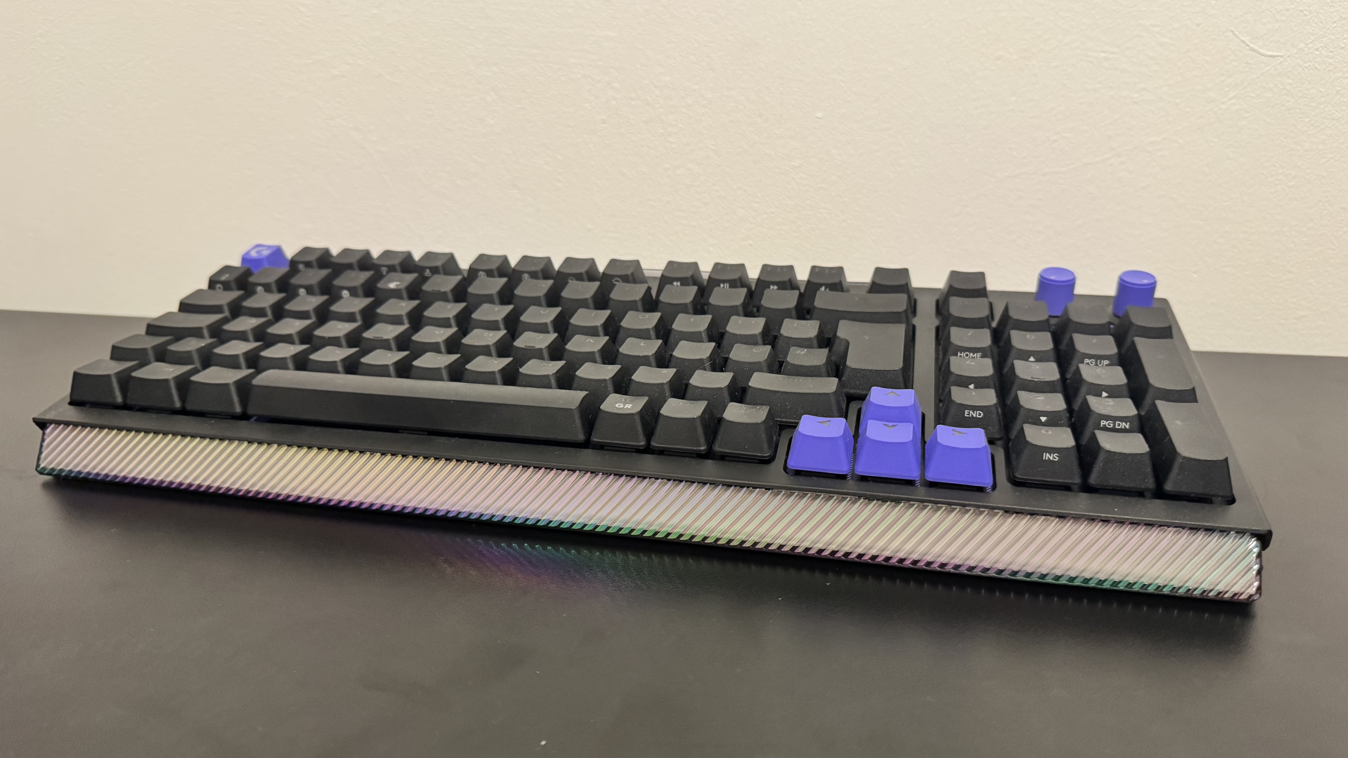 The Logitech G512 X gaming keyboard from the bottom on a black table