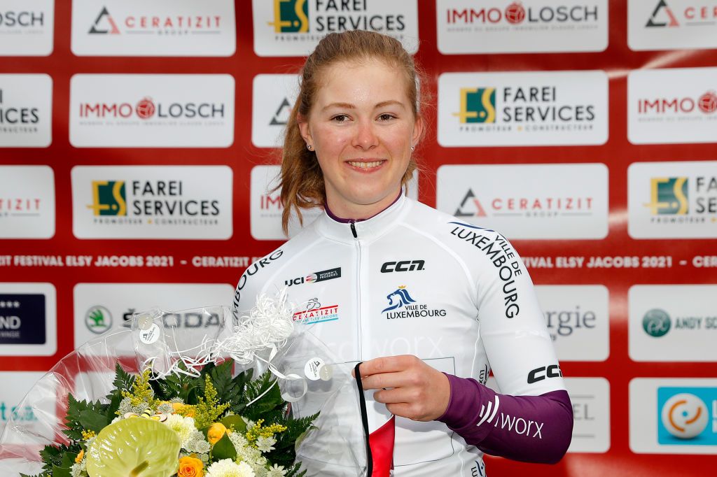 LUXEMBOURG LUXEMBOURG APRIL 30 Lonneke Uneken of Netherlands and Team SD Worx white best young jersey celebrates at podium during the 13th Ceratizit Festival Elsy Jacobs 2021 Prologue a 22km Individual Time Trial stage from Luxembourg to LuxembourgCessange 305m Covid safety measures Flowers ITT felsy UCIProSeries April 30 2021 in Luxembourg Luxembourg Photo by Bas CzerwinskiGetty Images