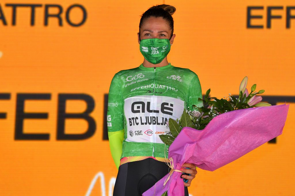 CUNEO ITALY JULY 02 Tatiana Guderzo of Italy and Team Ale Btc Ljubljana Green Mountain Jersey celebrates at podium during the 32nd Giro dItalia Internazionale Femminile 2021 Stage 1 a 267 Team Time Trial stage from Fossano to Cuneo 540m TTT GiroDonne UCIWWT on July 02 2021 in Cuneo Italy Photo by Luc ClaessenGetty Images