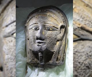 A silver facemask gilded with gold was found on the face of the mummy.