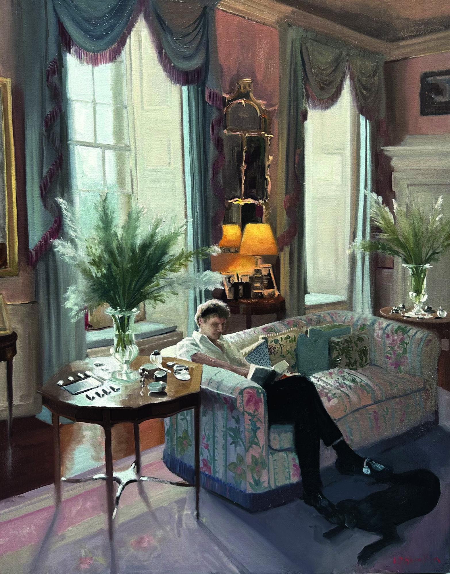 The actor Victor Hope sitting on a sofa at home