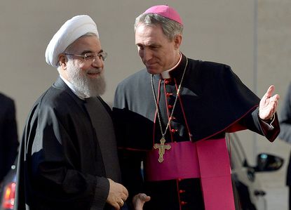 Iran's president pays a visit to Pope Francis at the Vatican