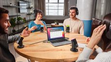 Four people recording a podcast using RØDE connect