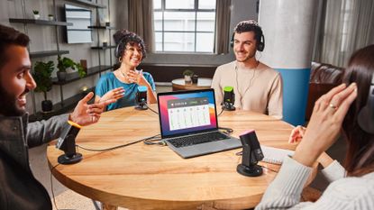 Four people recording a podcast using Rode connect