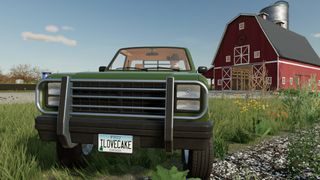 Farming Simulator 22 pickup truck with license plate that spells out I LOVE CAKE