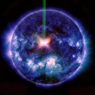 A three wavelength composite view of the X1.6-class solar flare peaking around 17:45 UT on September 10, 2014. 