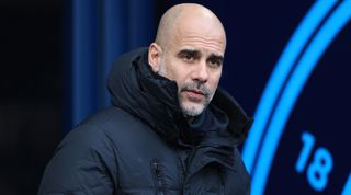 Manchester City manager Pep Guardiola looks on during the Emirates FA Cup Third Round match between Manchester City and Huddersfield Town at Etihad Stadium on January 7, 2024 in Manchester, England. (Photo by Simon Stacpoole/Offside/Offside via Getty Images)