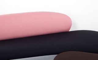 Abstract shapes of a Isamu Noguchi sofa for Vitra upholstered in pink, white and black Kvadrat fabric