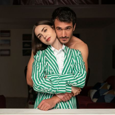 Emily in Paris wears a green and white striped blazer