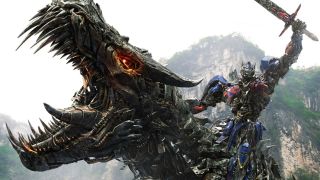 Optimus Prime riding a dinobot in Transformers: Age of Extinction.