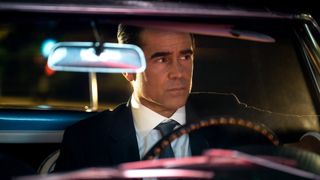 Colin Farrell's John Sugar sits in an open-top car in Apple TV Plus' Sugar series