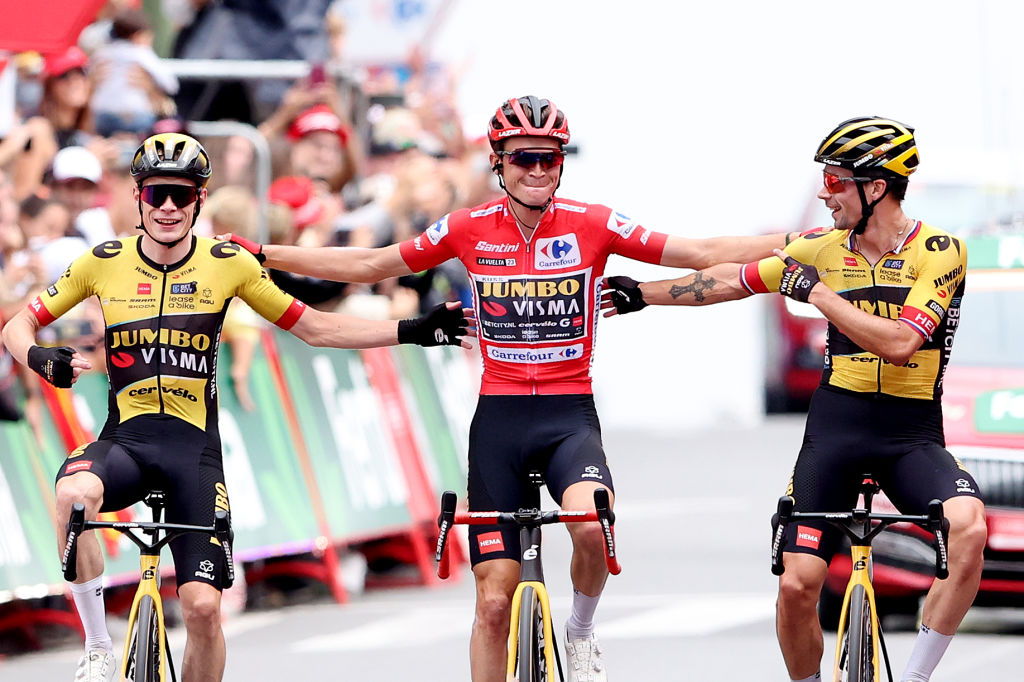 GUADARRAMA, SPAIN - SEPTEMBER 16: (L-R) Jonas Vingegaard of Denmark, Sepp Kuss of The United States - Red Leader Jersey final overall winner and Primoz Roglic of Slovenia and Team Jumbo-Visma cross the finish line during the 78th Tour of Spain 2023, Stage 20 a 207.8km stage from Manzanares El Real to Guadarrama / #UCIWT / on September 16, 2023 in Guadarrama, Spain. (Photo by Alexander Hassenstein/Getty Images)