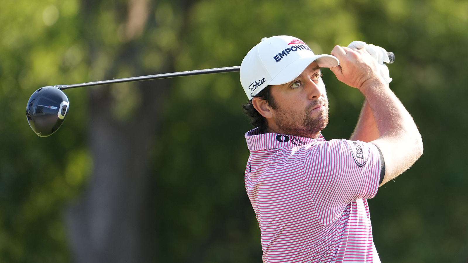 Davis Riley hits a driver off the tee