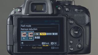 Use red eye reduction options in the camera menu to reduce the effect