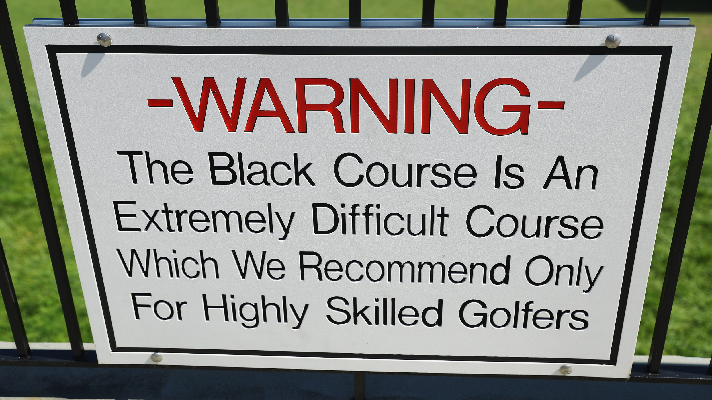The warning sign at Bethpage Black