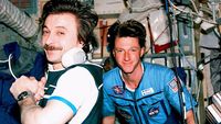 Mir-23 flight engineer Aleksandr Lazutkin and Michael Foale in the Base Block module.