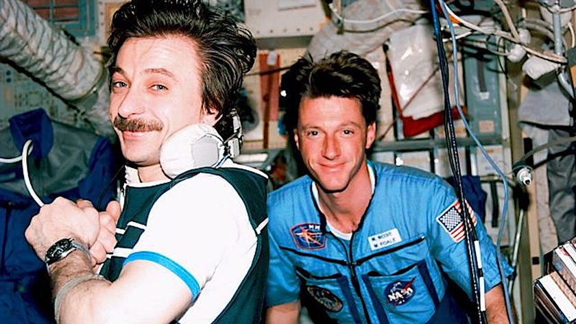 Mir-23 flight engineer Aleksandr Lazutkin and Michael Foale in the Base Block module.