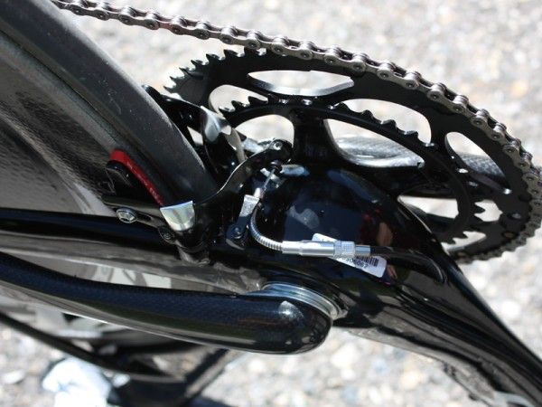 The rear brake is located down below the chain stays where the air is already turbulent.