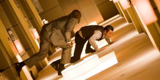 Joseph Gordon-Levitt fights off a dream in Inception