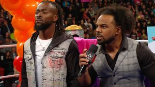 Kofi Kingston and Xavier Woods verbally assaulting Big E in the ring