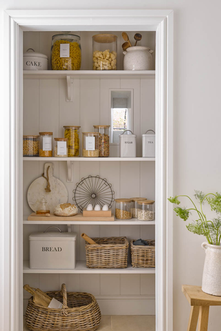 kitche pantry shelves with baskets and containers