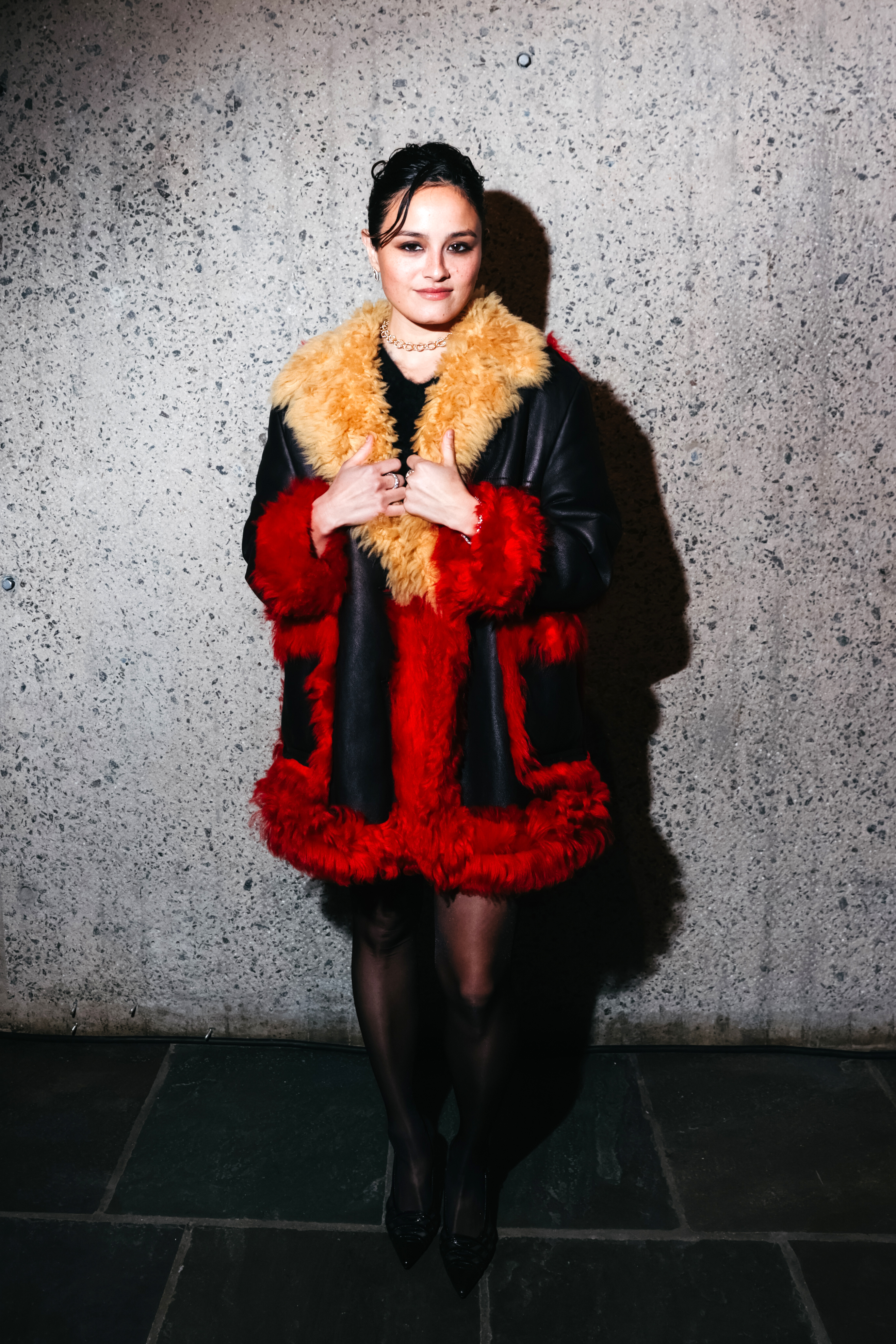 Chase Sui Wonders styled the same fur-trimmed leather coat as Rihanna in 2014