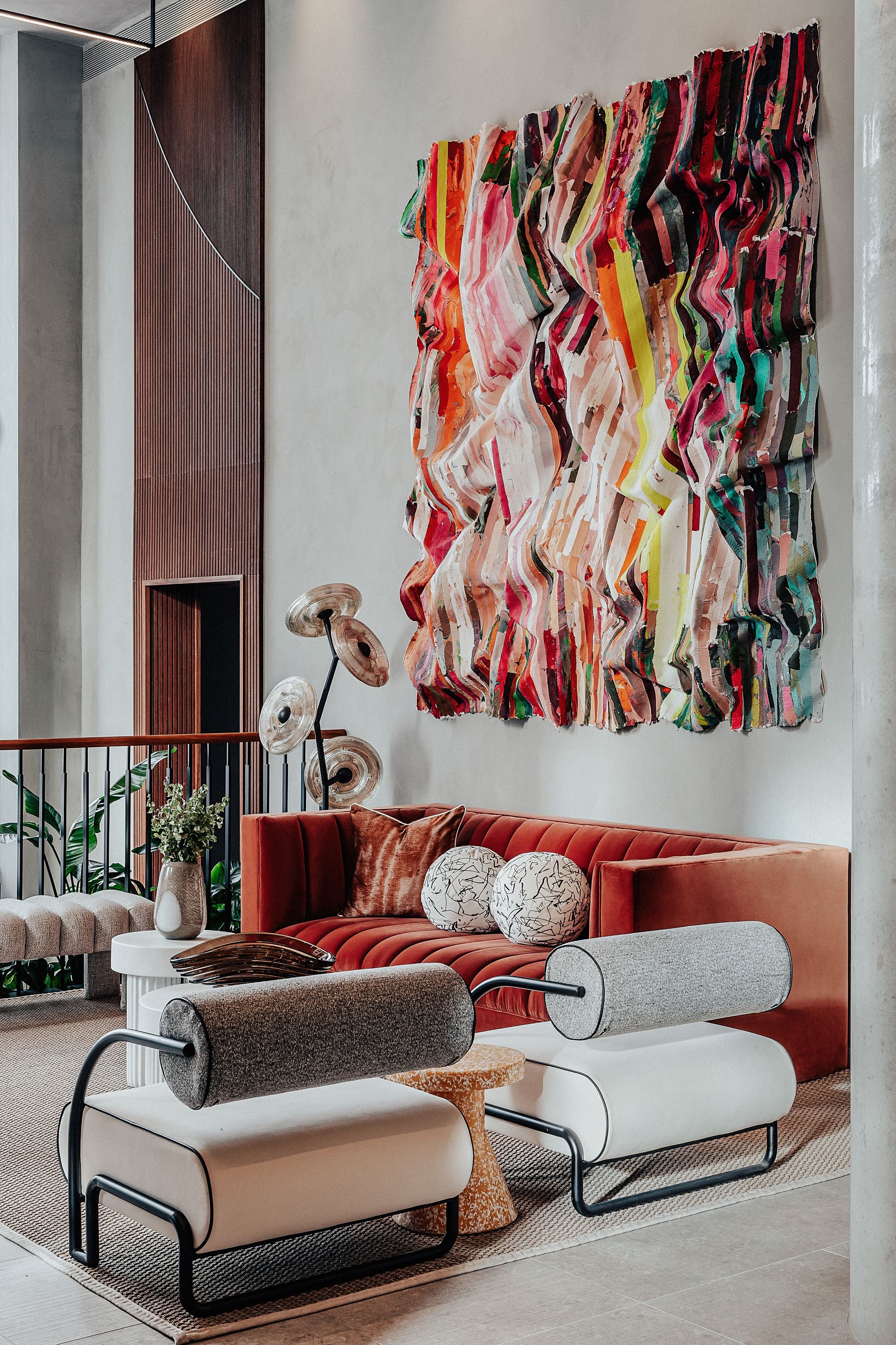 Conran and Partners_Author reception lobby seating area with colourful artwork