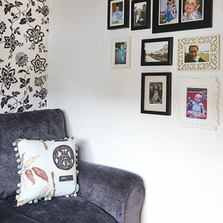 monochrome guest bedroom with picture wall