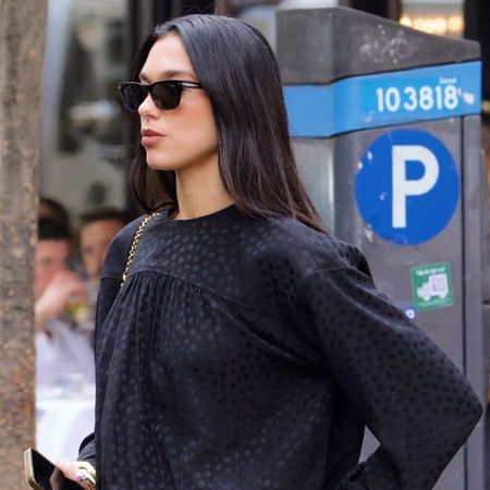 Dua Lipa was spotted in black straight-leg jeans, cheetah heels, and a Chlo&eacute; purse in the West Village