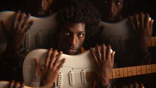Amani Burnham with his trusty Fender Strat