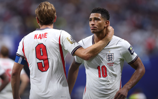 Harry Kane #9 of England consoles Jude Bellingham #10 of England after the FIFA World Cup 2026 Semi Final match between England and Argentina at Atlanta Stadium on July 15, 2026 in Atlanta, Georgia.