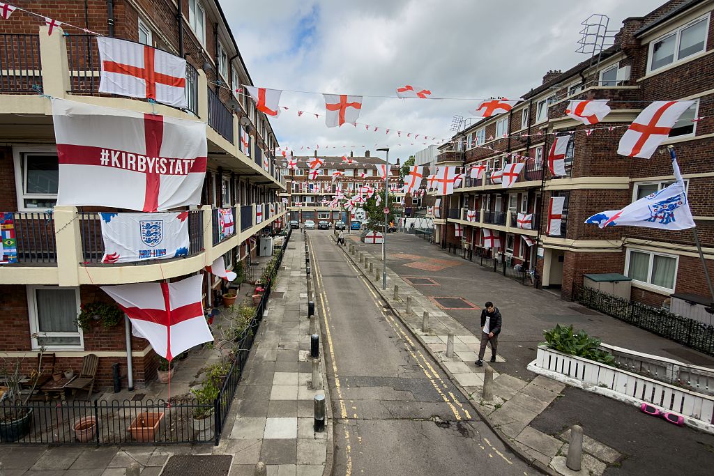 Hundreds of George Cross flags are displayed on balconies and lampposts as residents of the Kirby Estate decorate their homes in support of the England team's bid to win the 2026 FIFA World Cup