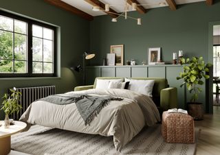 green bedroom with wood panelling and gold lighting