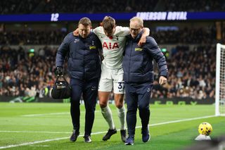 Micky van de Ven of Tottenham Hotspur is substituted after going down with an injury during the Premier League match between Tottenham Hotspur and Chelsea FC at Tottenham Hotspur Stadium on November 06, 2023 in London, England.
